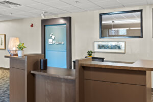 room with brown reception desk